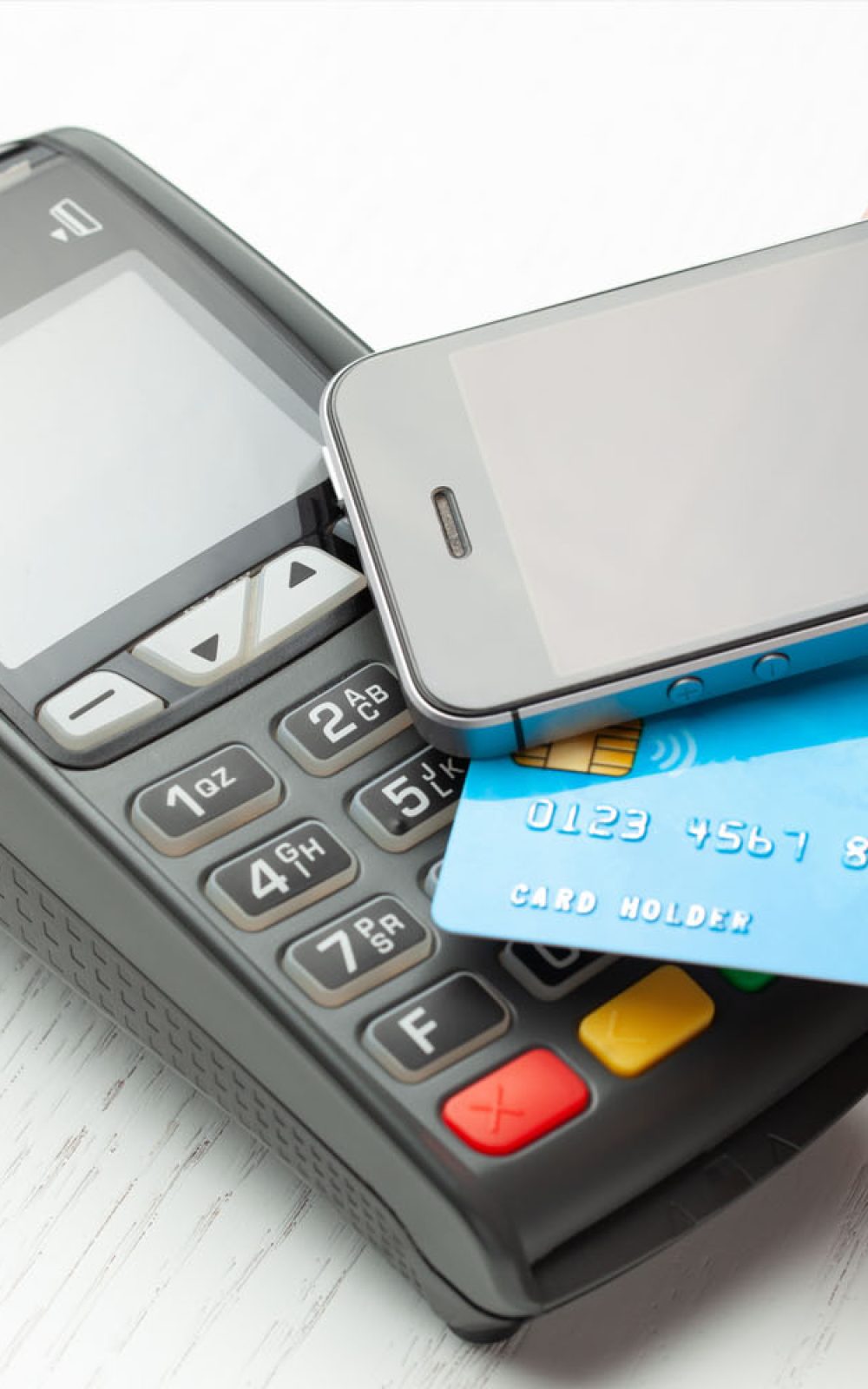 Contactless payment by credit card and smartphone phone.